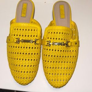 Yellow slide on shoes